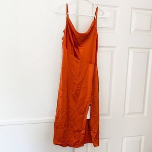 Burnt orange satin cowl dress with a thigh split size M